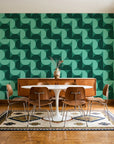 Ember Mosaic Emerald retro geometric wallpaper in a mid-century dining room with a teak sideboard and tulip table