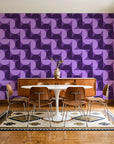 Ember Mosaic Plum retro geometric wallpaper in a mid-century dining room with a teak sideboard and tulip table