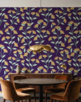 Evening Garden Plum botanical floral wallpaper behind a walnut credenza and round table in an elegant dining room