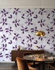 Falling Softly Plum botanical leaf wallpaper in an elegant dining room