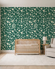 First Bloom Emerald ditsy floral wallpaper in a calm, light-filled nursery