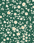 First Bloom Emerald ditsy floral wallpaper in emerald and ivory