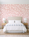 First Bloom Rose ditsy floral wallpaper behind a queen bed in a bright coastal bedroom