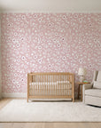 First Bloom Rose ditsy floral wallpaper in a calm, light-filled nursery