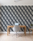 Floral Fantasia Charcoal diamond lattice wallpaper behind a modern oak desk in a bright home office