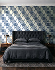 Floral Fantasia Ivory diamond lattice wallpaper behind a tufted headboard in a dark, moody bedroom