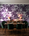 Frost Garden Veil Plum floral wallpaper in a dark moody dining room with a candlelit table