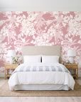 Frost Garden Veil Rose floral wallpaper behind a queen bed in a bright coastal bedroom
