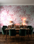 Frost Garden Veil Rose floral wallpaper in a dark moody dining room with a candlelit table
