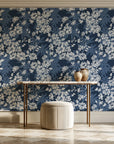 Frost Garden Veil Slate floral wallpaper on the wall of a grand entry foyer