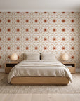 Frost Mosaic Terracotta geometric tile wallpaper behind a low platform bed in a serene Japandi bedroom