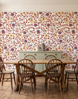 Garden Reverie Terracotta floral wallpaper in a farmhouse dining room with a sage sideboard and rustic trestle table