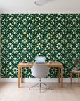 Gilt Scatter Emerald floral scatter wallpaper behind a modern oak desk in a bright home office