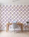 Gilt Scatter Plum floral scatter wallpaper behind a modern oak desk in a bright home office