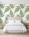 Harbor Fern Moss fern wallpaper behind a queen bed in a bright coastal bedroom