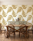 Harbor Fern Ochre fern wallpaper in a farmhouse dining room with a sage sideboard and rustic trestle table