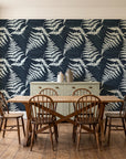 Harbor Fern Slate fern wallpaper in a farmhouse dining room with a sage sideboard and rustic trestle table