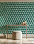 Hidden Court Emerald floral ogee wallpaper on the wall of a grand entry foyer