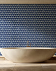 Hidden Court Midnight floral ogee wallpaper creating ambiance in a serene spa bathroom