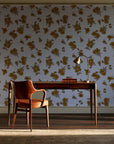 Hidden Garden Marigold floral wallpaper as a feature wall in a home study