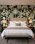 Hush & Palm Ebony palm trees wallpaper behind the headboard of a king bed in a contemporary hotel guest room
