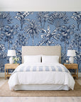 Hush & Palm Midnight palm trees wallpaper behind a queen bed in a bright coastal bedroom