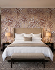 Hush & Palm Terracotta palm trees wallpaper behind the headboard of a king bed in a contemporary hotel guest room