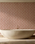 Indigo Labyrinth Terracotta geometric wallpaper creating ambiance in a serene spa bathroom