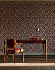 Indigo Labyrinth Terracotta geometric wallpaper as a feature wall in a home study