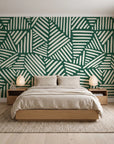 Kinetic Etch Emerald hand-drawn lines wallpaper behind a low platform bed in a serene Japandi bedroom