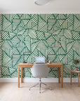 Kinetic Etch Emerald hand-drawn lines wallpaper behind a modern oak desk in a bright home office