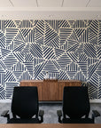 Kinetic Etch Ink hand-drawn lines wallpaper above a walnut credenza in a modern conference room