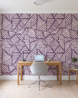 Kinetic Etch Plum hand-drawn lines wallpaper behind a modern oak desk in a bright home office