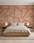Kinetic Etch Terracotta hand-drawn lines wallpaper behind a low platform bed in a serene Japandi bedroom