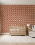 Linen & Leaf Terracotta leaf wallpaper in a calm, light-filled nursery