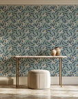 Magnolia Morning Charcoal magnolia bloom wallpaper on the wall of a grand entry foyer
