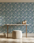 Magnolia Morning Slate magnolia bloom wallpaper on the wall of a grand entry foyer