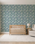 Magnolia Morning Slate magnolia bloom wallpaper in a calm, light-filled nursery