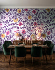 Matisse Reverie Plum folk floral wallpaper in a dark moody dining room with a candlelit table