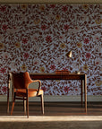Matisse Reverie Rust folk floral wallpaper as a feature wall in a home study