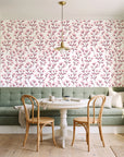 Meadow Light Blush meadow flower wallpaper as a feature wall in a sunlit breakfast nook