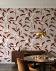 Mistletoe Trail Terracotta mistletoe wallpaper in an elegant dining room