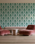 Misty Fern Romance Emerald damask wallpaper in a boutique hotel sitting area