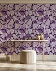 Muted Block Plum geometric wallpaper on the wall of a grand entry foyer