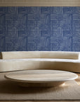 Nomad Stripe Indigo geometric wallpaper in an elegant living room