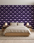 Ocean Fortress Plum art deco scale wallpaper behind a low platform bed in a serene Japandi bedroom