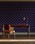 Ocean Fortress Plum art deco scale wallpaper as a feature wall in a home study