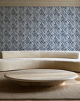 Olive Fret Charcoal geometric fret wallpaper in an elegant living room