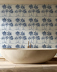 Palm Shade Navy palm grove wallpaper creating ambiance in a serene spa bathroom
