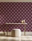 Pastel Bouquet Parade Oxblood botanical damask wallpaper on the wall of a grand entry foyer